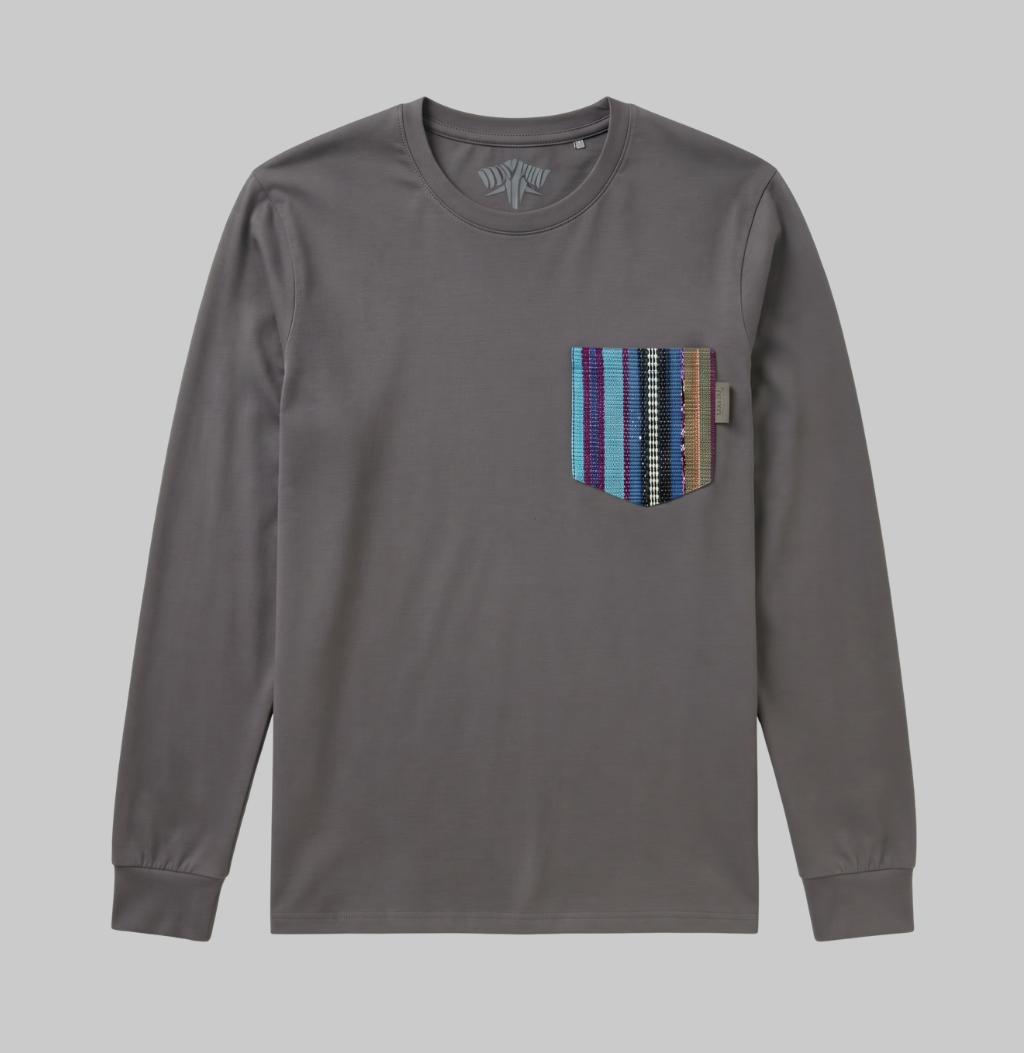 A long-sleeve crewneck shirt in dark gray, featuring a chest pocket with vertical multicolor stripes in shades of blue, purple, brown, and white.