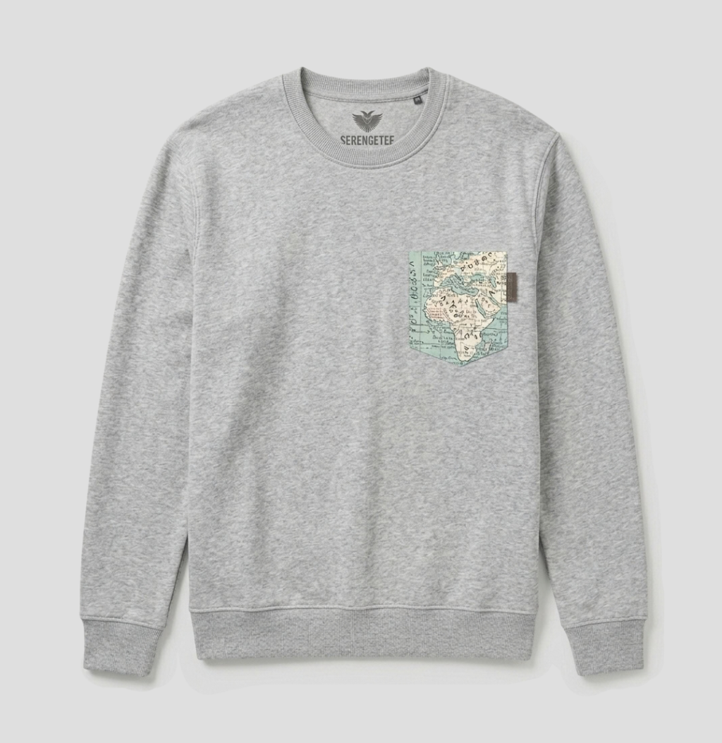 A light gray heather crewneck sweatshirt with a graphic map print on the left chest pocket, shown flat against a light gray background.
