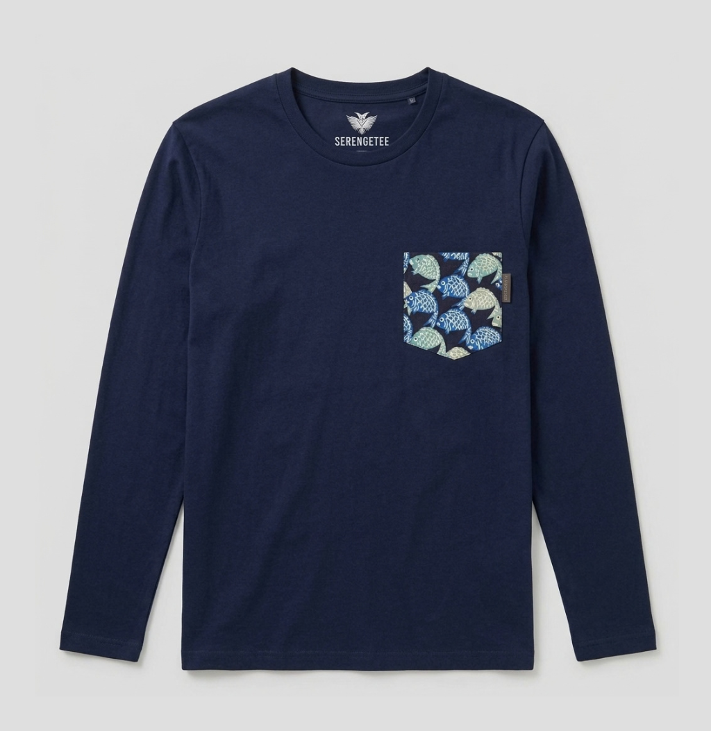 A dark navy blue long-sleeve t-shirt by Serenmute, featuring a chest pocket with a blue, green, and beige leaf pattern, displayed on a light gray background.