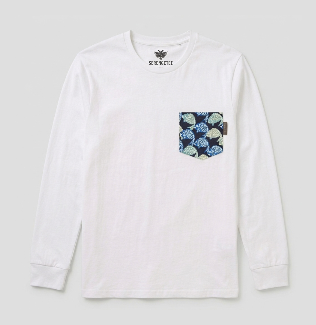 A white long-sleeve crewneck shirt by Serengete, featuring a patterned chest pocket with blue, green, and black fish designs, shown on a light gray background.