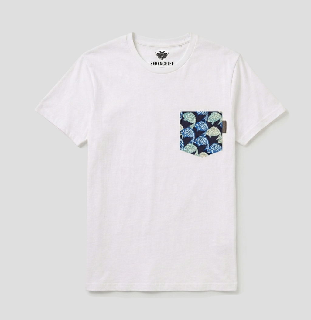 Blue and green fish on a navy background fabric pocket on a white t-shirt