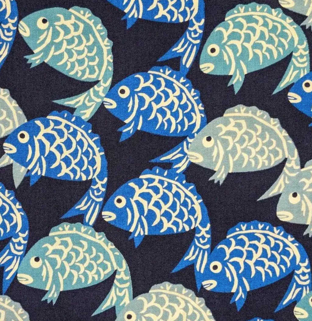Blue and green fish on a navy background fabric pocket