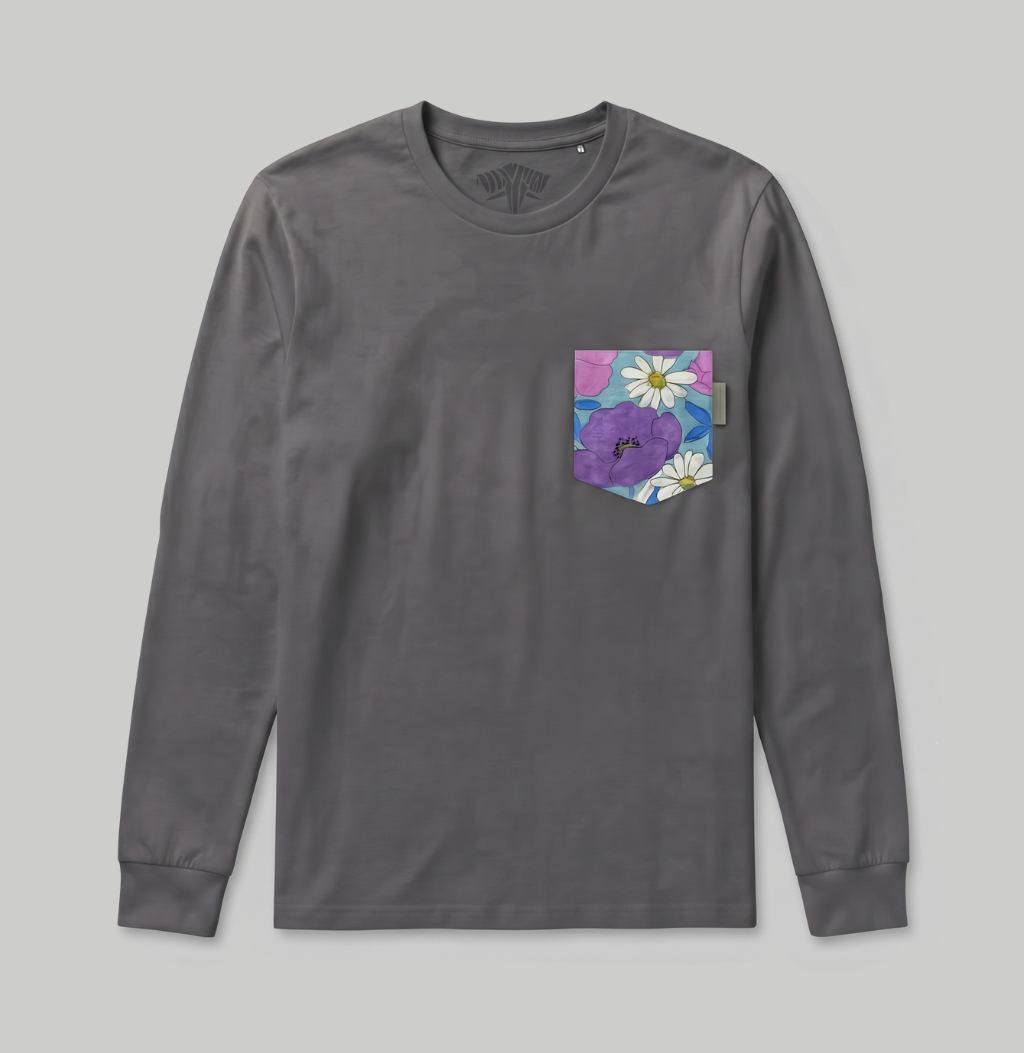 A dark gray long-sleeve crewneck shirt with a chest pocket featuring a colorful floral print of purple flowers and white daisies on a light gray background.