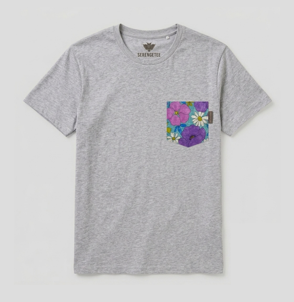 A heather gray short-sleeve pocket t-shirt by Scenic Trails, featuring a colorful floral print pocket with pink, purple, and white flowers on a light gray background.