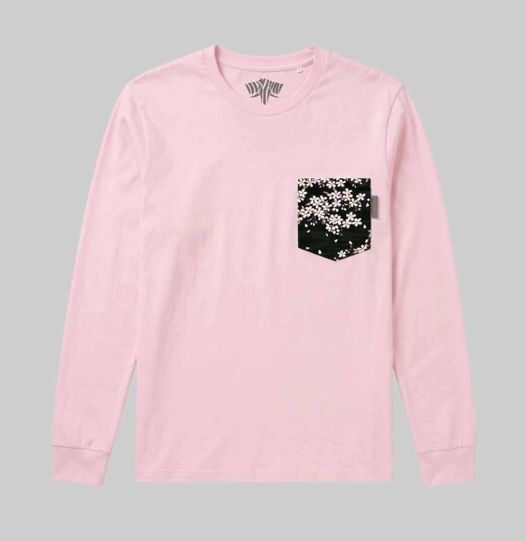 A black floral pattern on a pink long sleeve