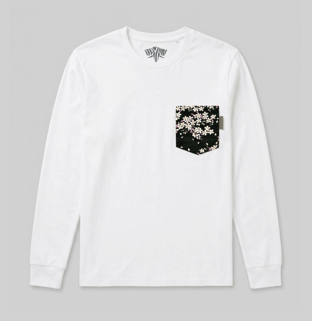 A black floral pattern on a white long sleeve