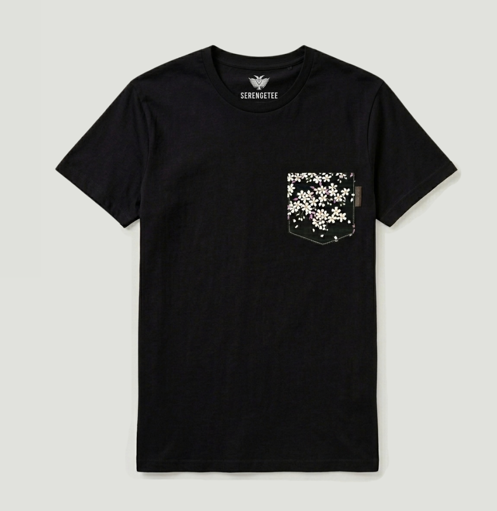 Pink floral fabric pocket on a black t-shirt