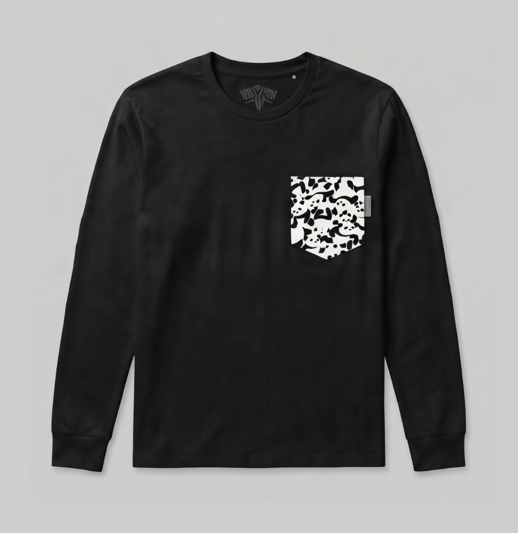 A black long-sleeve crewneck shirt with a white camouflage pattern pocket on the left chest, displayed flat against a neutral gray background.