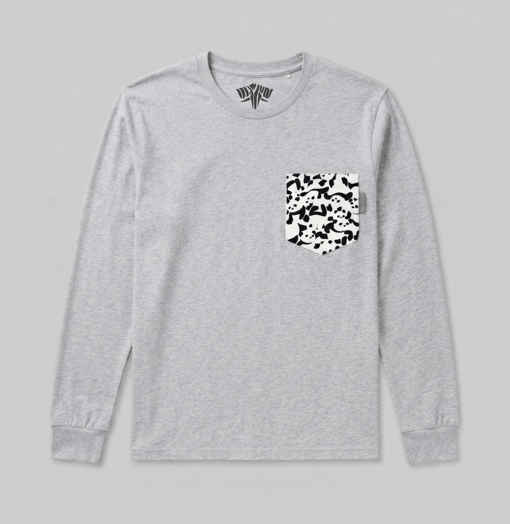 A light gray long-sleeve crewneck shirt with a black and white camouflage patterned chest pocket, displayed flat against a neutral gray background.