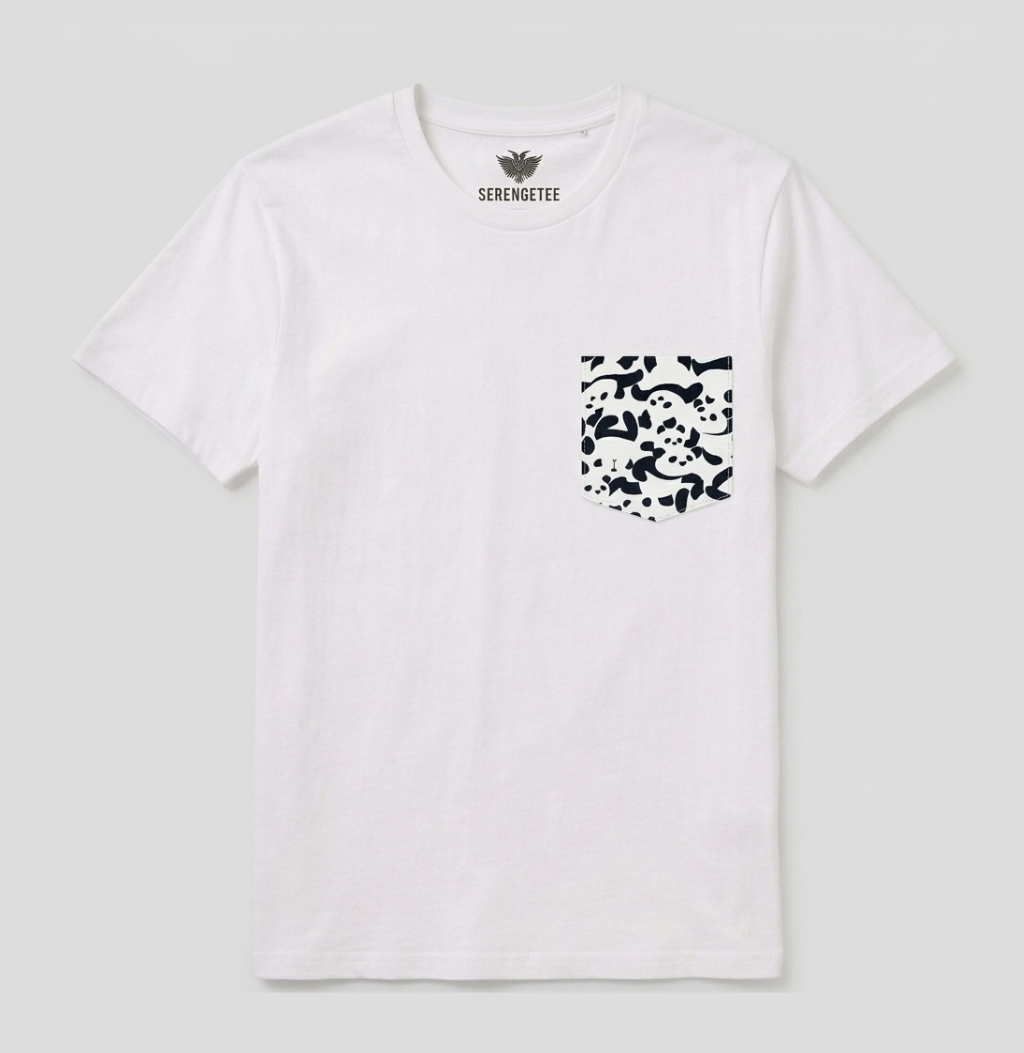 A white short-sleeve crewneck pocket t-shirt by Serengette, featuring a black-and-white abstract patterned pocket on the left chest, displayed flat against a light gray background.