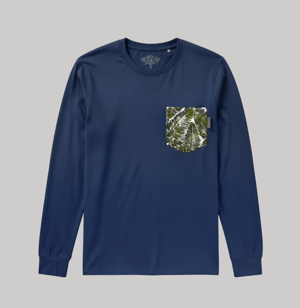 A navy blue long-sleeve crewneck shirt with a chest pocket featuring a green and white tropical leaf pattern, displayed on a solid gray background.