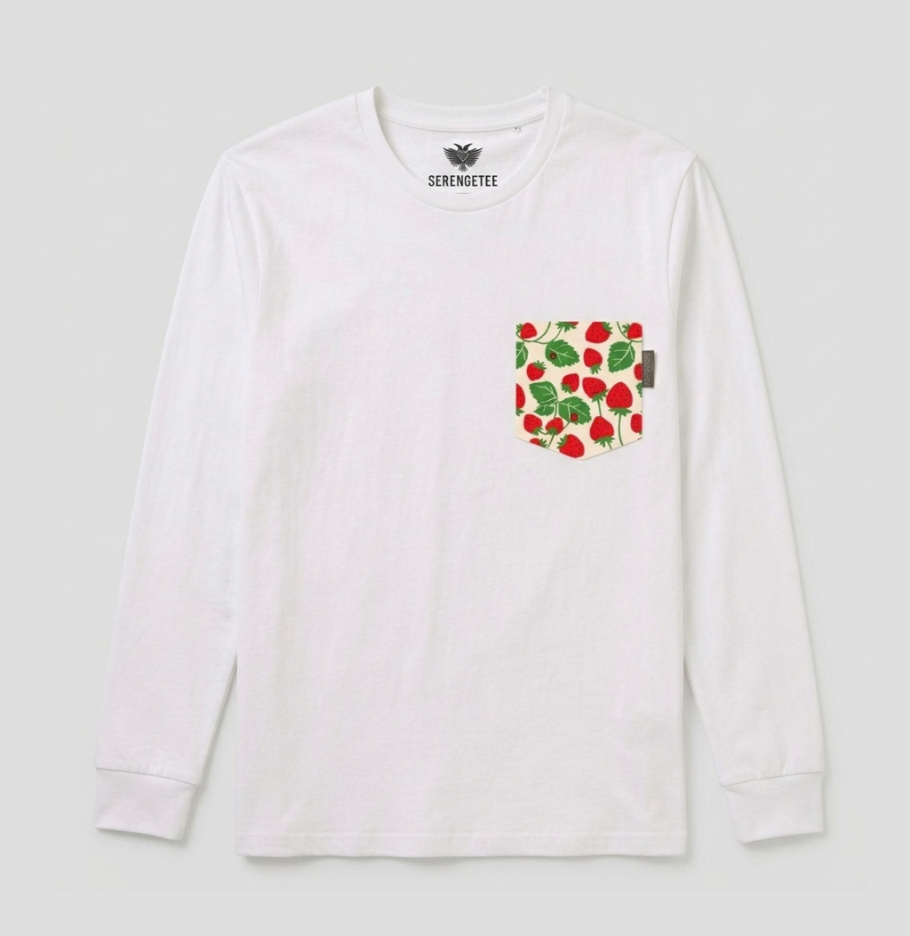 A white long-sleeve crewneck shirt by Serenmute, featuring a chest pocket with a red strawberry and green leaf pattern, shown against a light gray background.