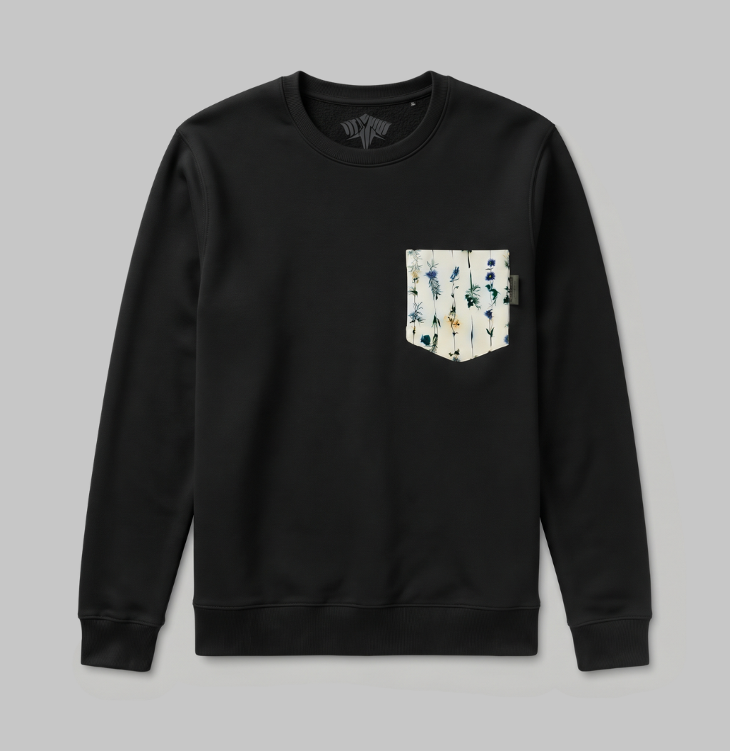 Flower pocket on a black crew sweater.