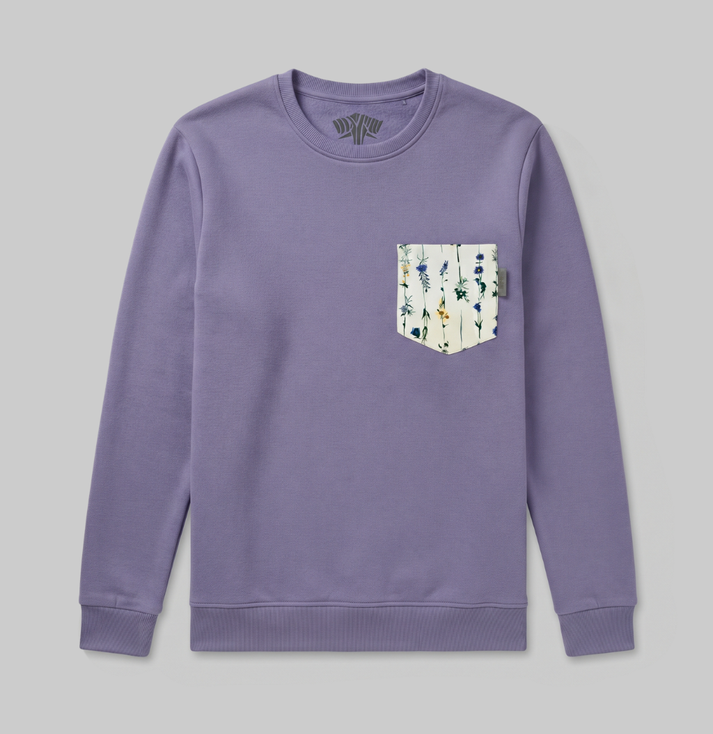 Flower pocket on a lavender crew sweater.