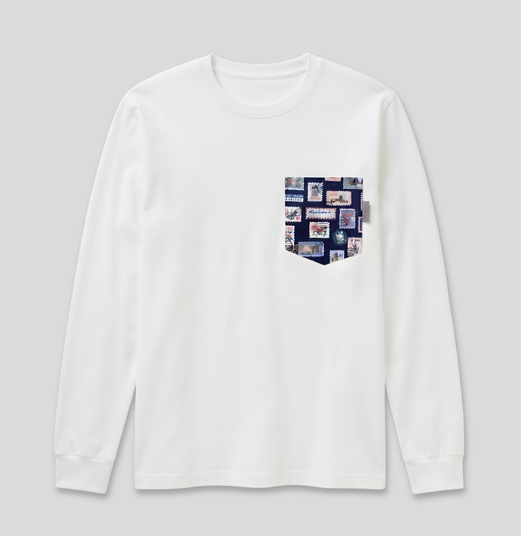 Navy passport stamp fabric pocket on a white long sleeve shirt.